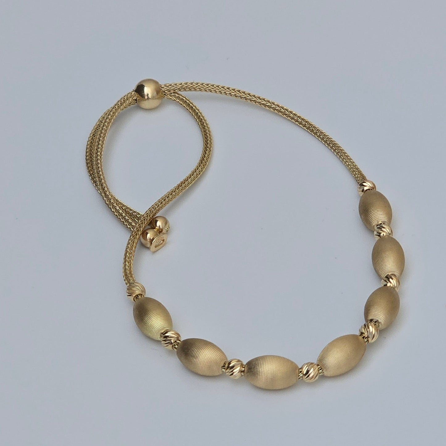 Bracelet à cordon coulissant